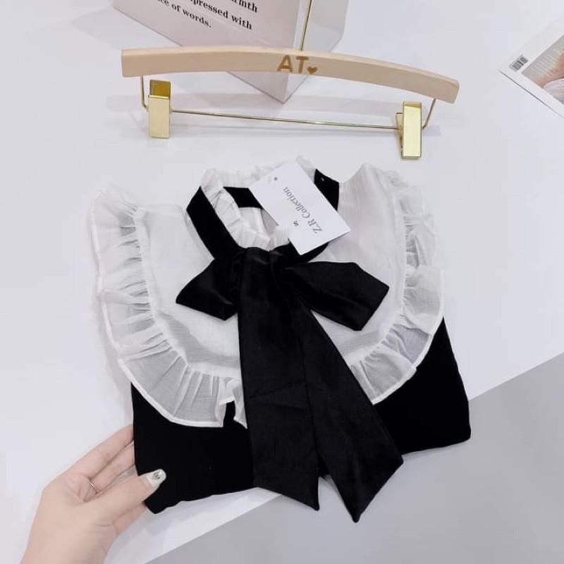 Váy đen nơ trắng pha tay dành cho nữ