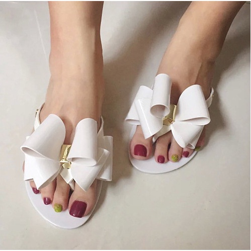 Dép đi trong nhà đính nơ Melissa đi biển đế phẳng xỏ ngón cho nữ