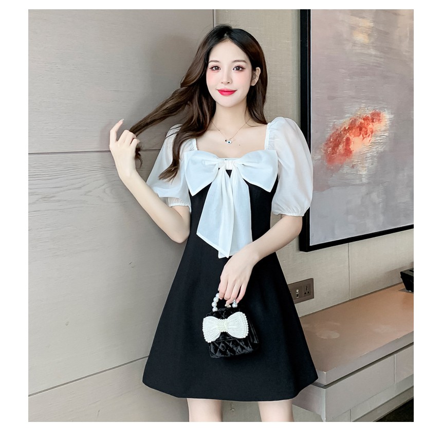Váy Đầm Nơ Bản To Tay Trắng Xinh Xắn Chào Hè