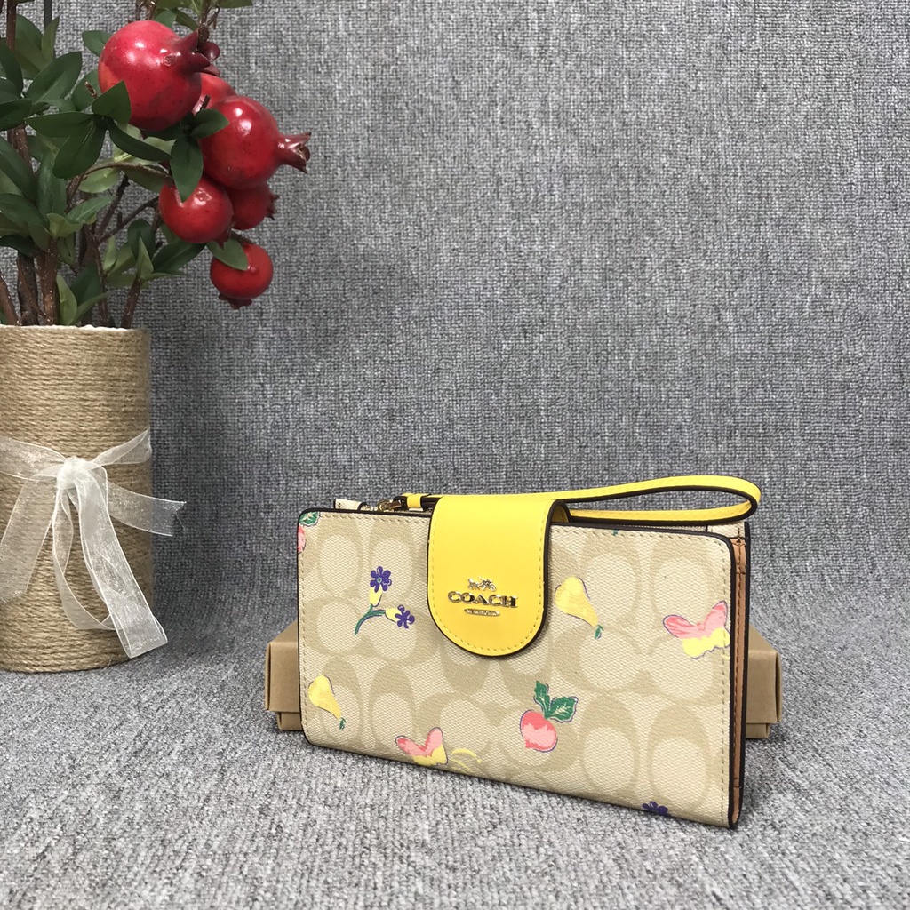 Ví clutch nữ cầm tay Coach có dây đeo cổ tay hàng xuất dư xịn có ngăn đựng điện thoại