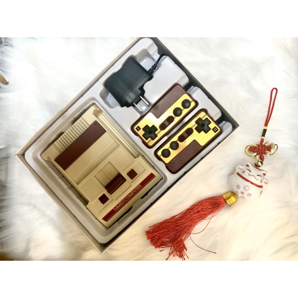 Máy game 4 nút tích hợp sẵn 500 game không trùng FAMILY COMPUTER có nấm, Tank, Jackal, Contra