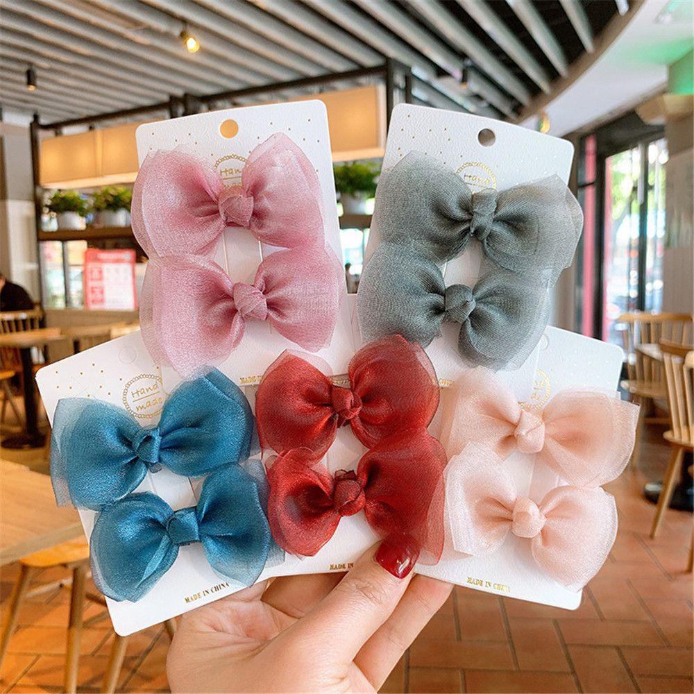 Bộ 2 Kẹp Tóc Nơ Bằng Vải Gạc Dễ Thương Cho Bé Gái