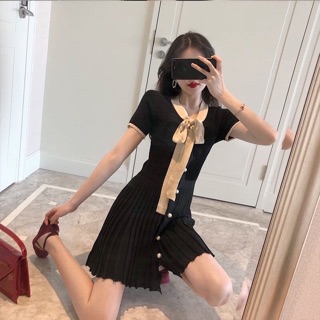 Váy len mongtoghi cổ nơ cúc ngọc