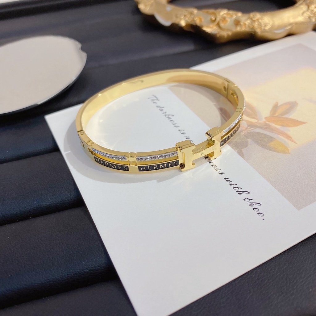 Vòng Tay Hermes Bằng Thép Titan Khắc Chữ H Thời Trang