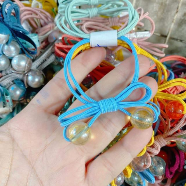 CỘT TÓC NƠ TRÒN HẠT CHÂU 2020