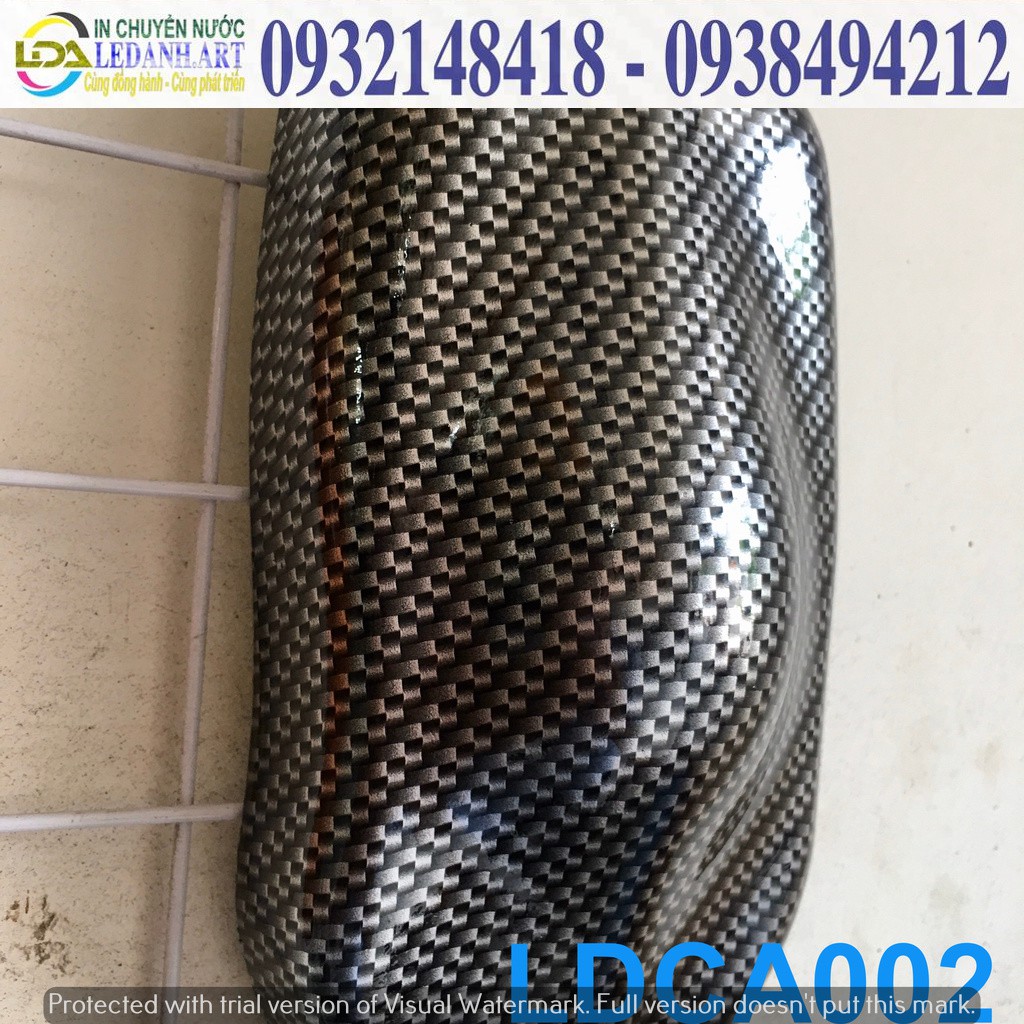 Phim sơn nhúng carbon 0.5x2m + chai xịt kích hoạt