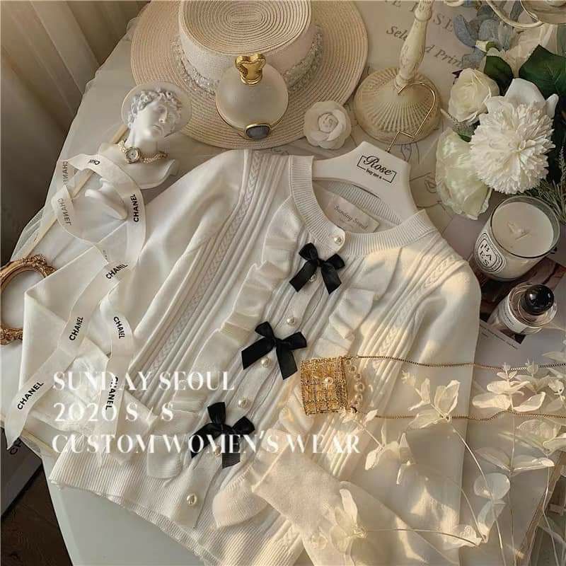 Áo len cổ tròn nơ ngực