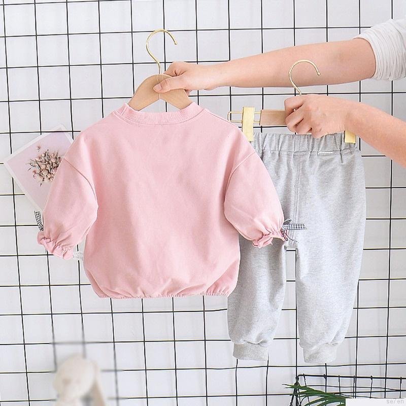 Set áo thun tay dài cổ tròn in họa tiết hoạt hình phối quần dài thời trang mùa thu cho bé gái Se7en