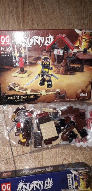Lắp ráp 1 hộp LegoNinja rồng QD653 có nhiều chi tiết