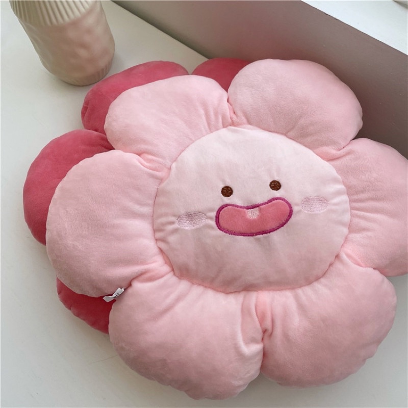 Gối bông hoa sún răng đáng yêu