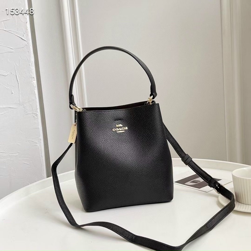 Túi Coach bucket màu trơn