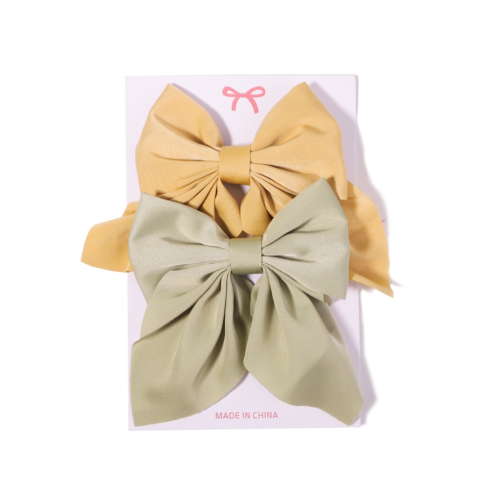 Set 2 kẹp tóc KIDSBOWS hình nơ họa tiết hoa xinh xắn dành cho nữ