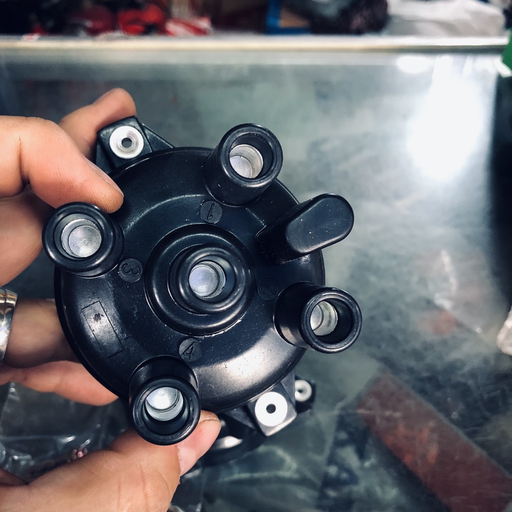 NẮP DELCO CHIA ĐIỆN MITSUBISHI JOLIE CHẾ HÒA KHÍ