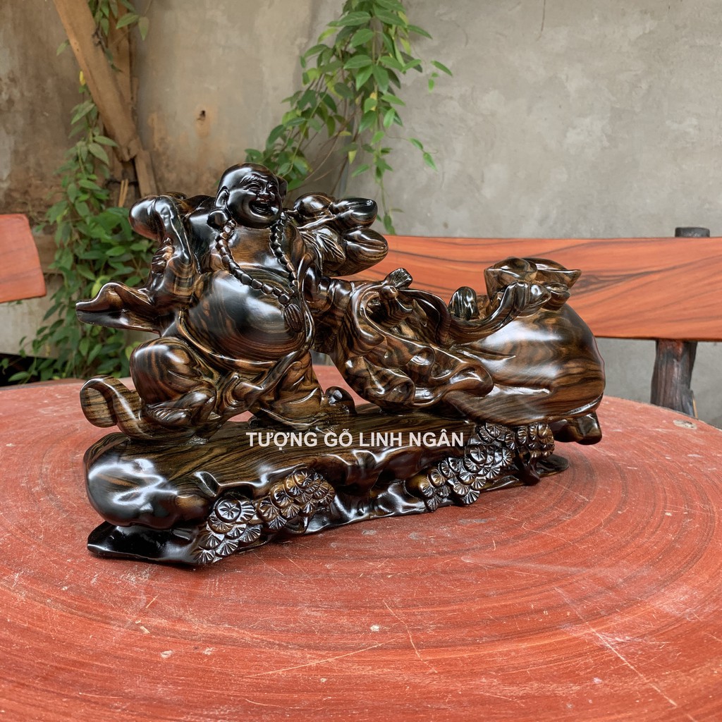 Tượng phật di lặc gỗ Mun kéo bao tiền