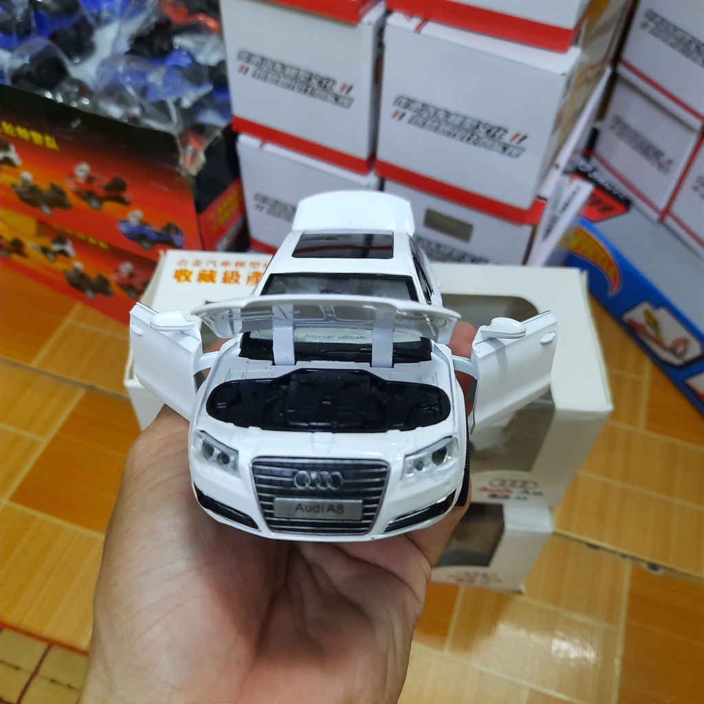 Đồ chơi trẻ em xe mô hình ô tô Audi A8 tỉ lệ 1:32 bằng kim loại xe có âm thanh và đèn ở được cửa