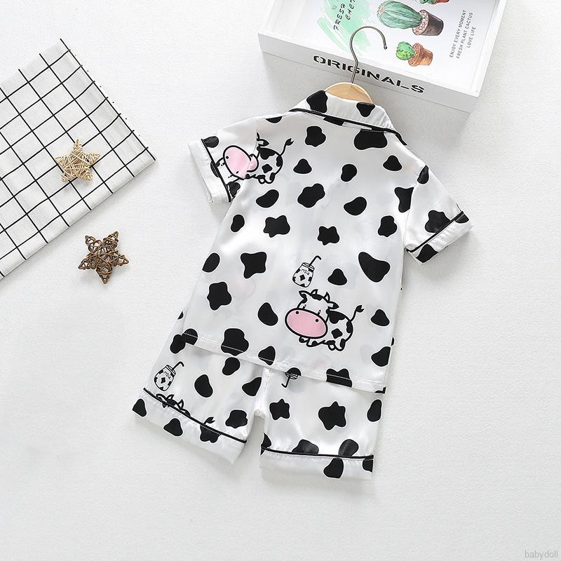 Set đồ ngủ quần short vải lụa lạnh ngắn tay in hình bò sữa cho bé 1-10 tuổi
