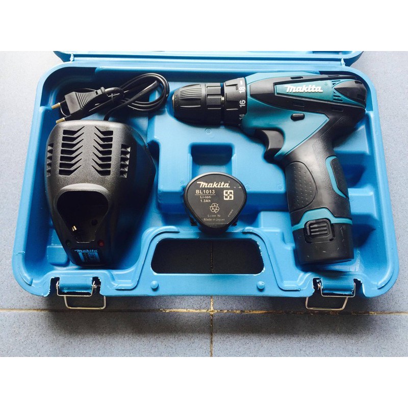 Máy khoan pin búa 12 vôn Makita DF330DWE -Xuất xứ Thái lan (đủ 3 chức năng bắn vít,khoan sắt, gỗ, đặc biệt khoan bê tông