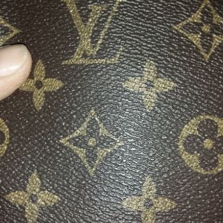 Cơm boTúi đeo chéo mini hiệu LV