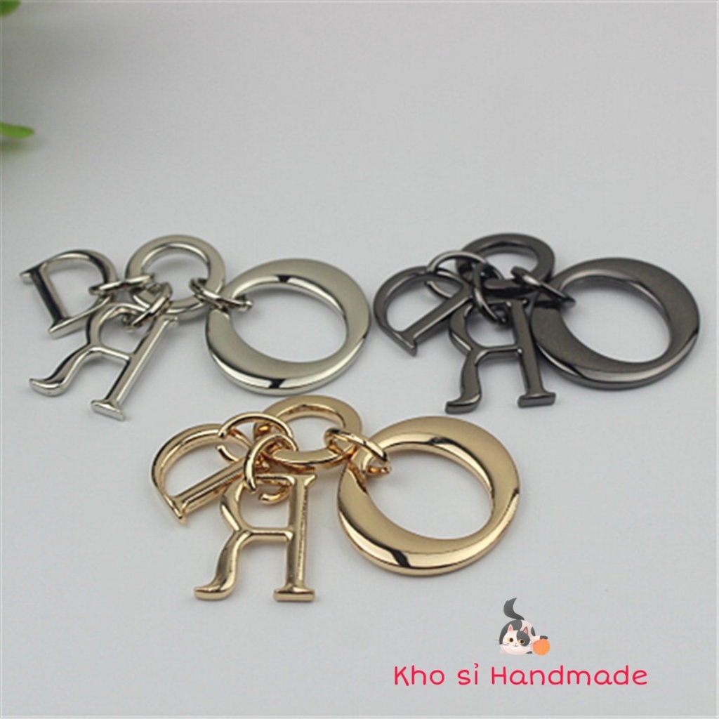 Phụ kiện gắn túi : Móc treo, chùm treo túi xách di-or