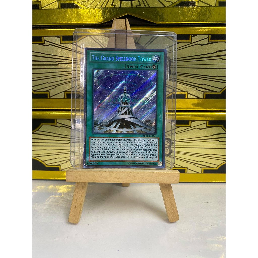 [ Dưa Hấu Yugioh ] Lá bài thẻ bài The Grand Spellbook Tower - Secret Rare - Tặng bọc bài nhựa bảo quản