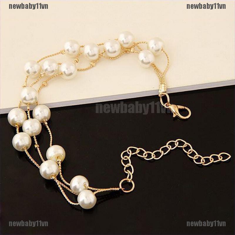 Bộ dây chuyền bông tai và vòng tay mạ bạc đính ngọc trai nhân tạo thời trang