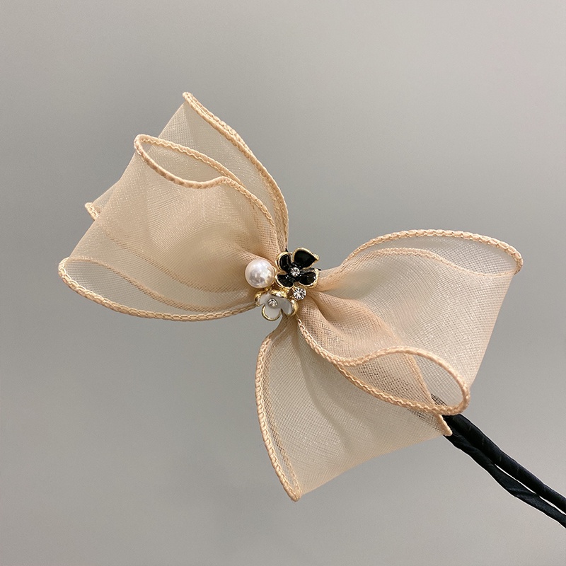 Thun côt tóc hình hoa kiểu dáng đáng yêu cho nữ