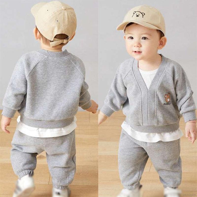 Set đồ thể thao 2 món gồm áo tay dài dáng rộng in hình gấu dễ thương + quần dài cho bé 1-6 tuổi