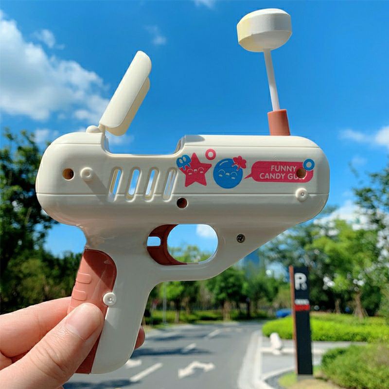 [sẵn  hàng,ảnh  thật]Súng Bắn Kẹo Hot Trends Tiktok Kèm 1 Chiếc Kẹo Mút cutee.