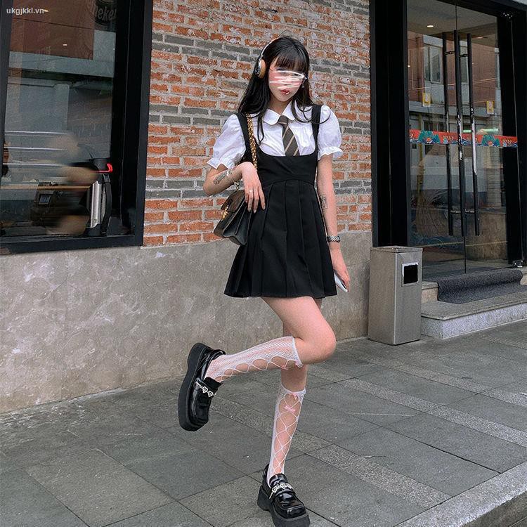 ◐Little black dress strap dress female summer hot girl jk uniform sling pleated skirt + puff sleeve shirt two-piece suit