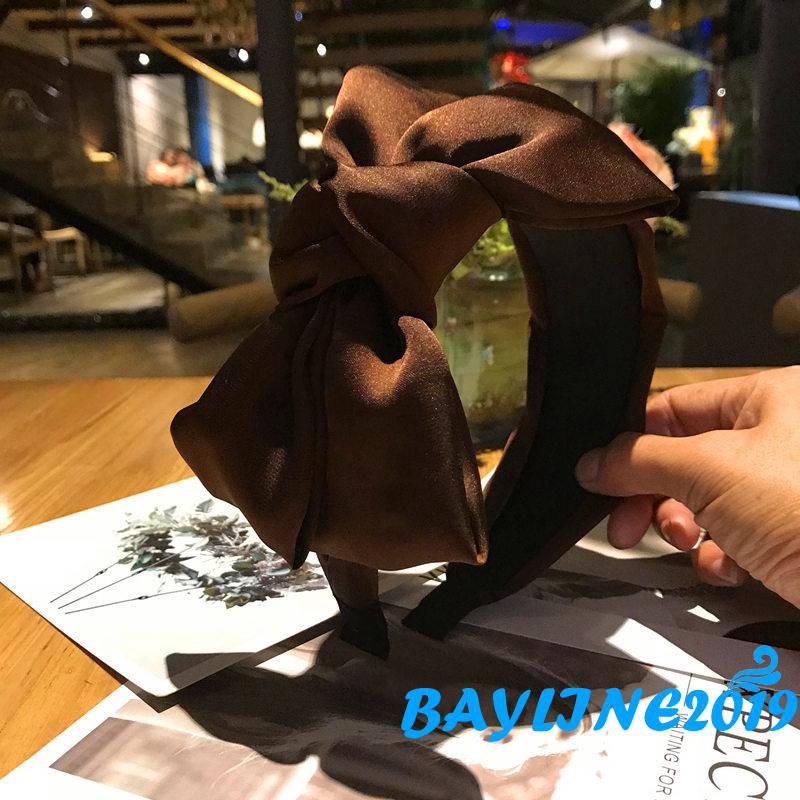 Cài tóc đính nơ thanh lịch cho nữ