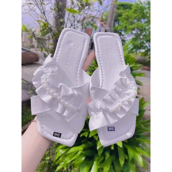dép bệt quai chéo nhúng kèm ngọc xịn xò nền da man bao êm. nắng mưa đều mang được. cam kết như hình( hình tự chụp )