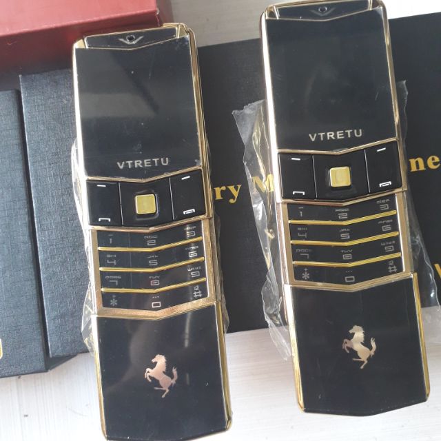Điện thoại v05 nắp trượt 2 sim 2 sóng