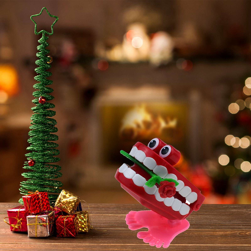 Đồ chơi lên dây cót hình hàm răng dễ thương cho bé