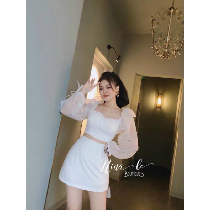 Set áo bèo vai tay dài và chân váy ôm sang chảnh