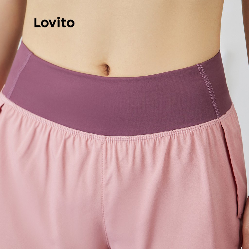 Quần short thể thao Lovito ghép nối màu phối túi xẻ tà L15X212 (màu hồng)