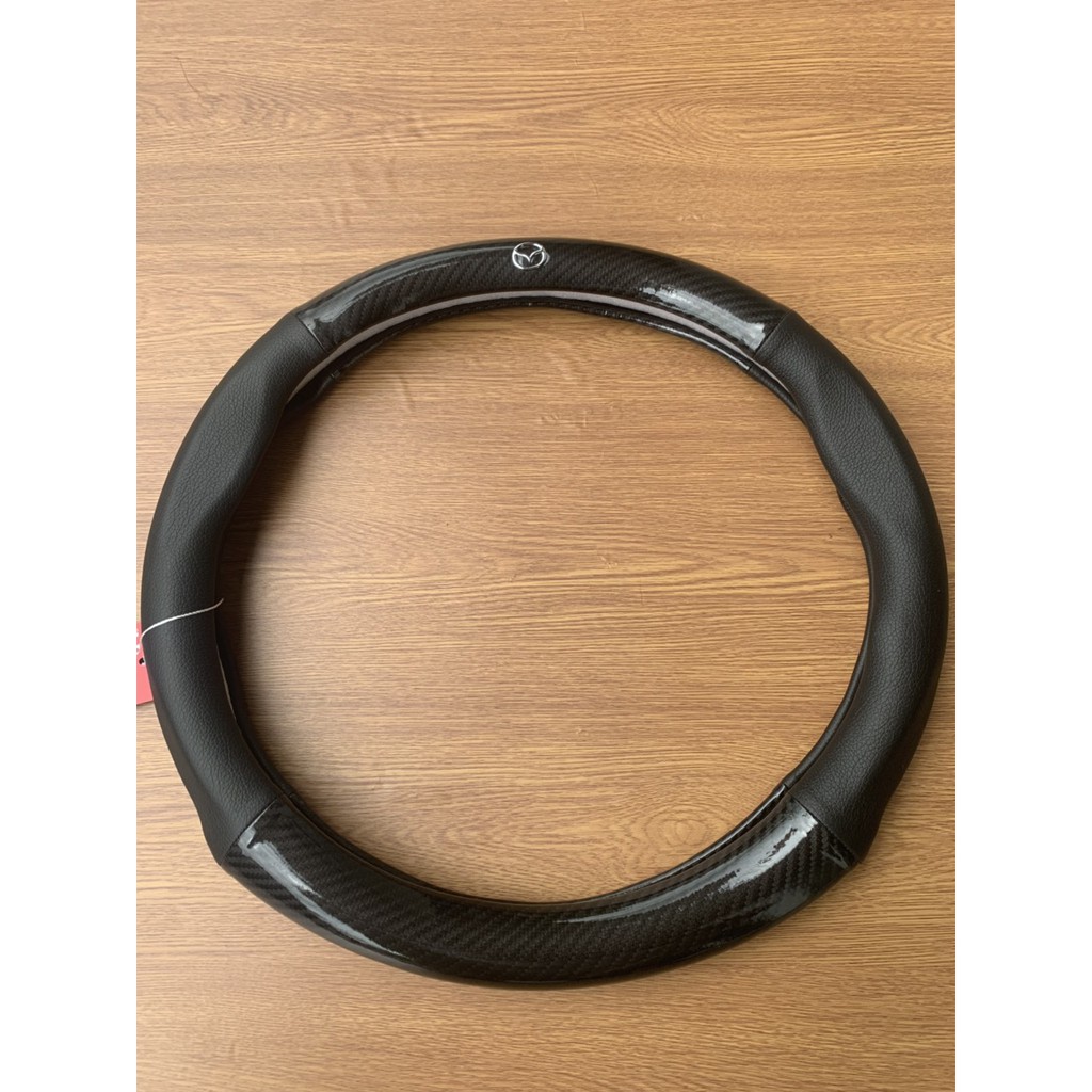 Bọc vô lăng Cacbon CAO CẤP có logo hãng xe