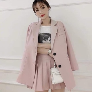 Set vest hồng + chân váy xếp ly