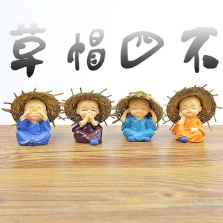 tượng 4 chú đội mũ