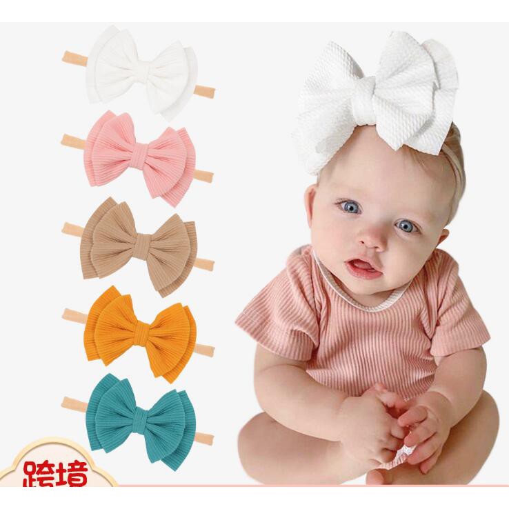 Băng đô vải Nylon co giãn đính nơ xinh xắn cho bé