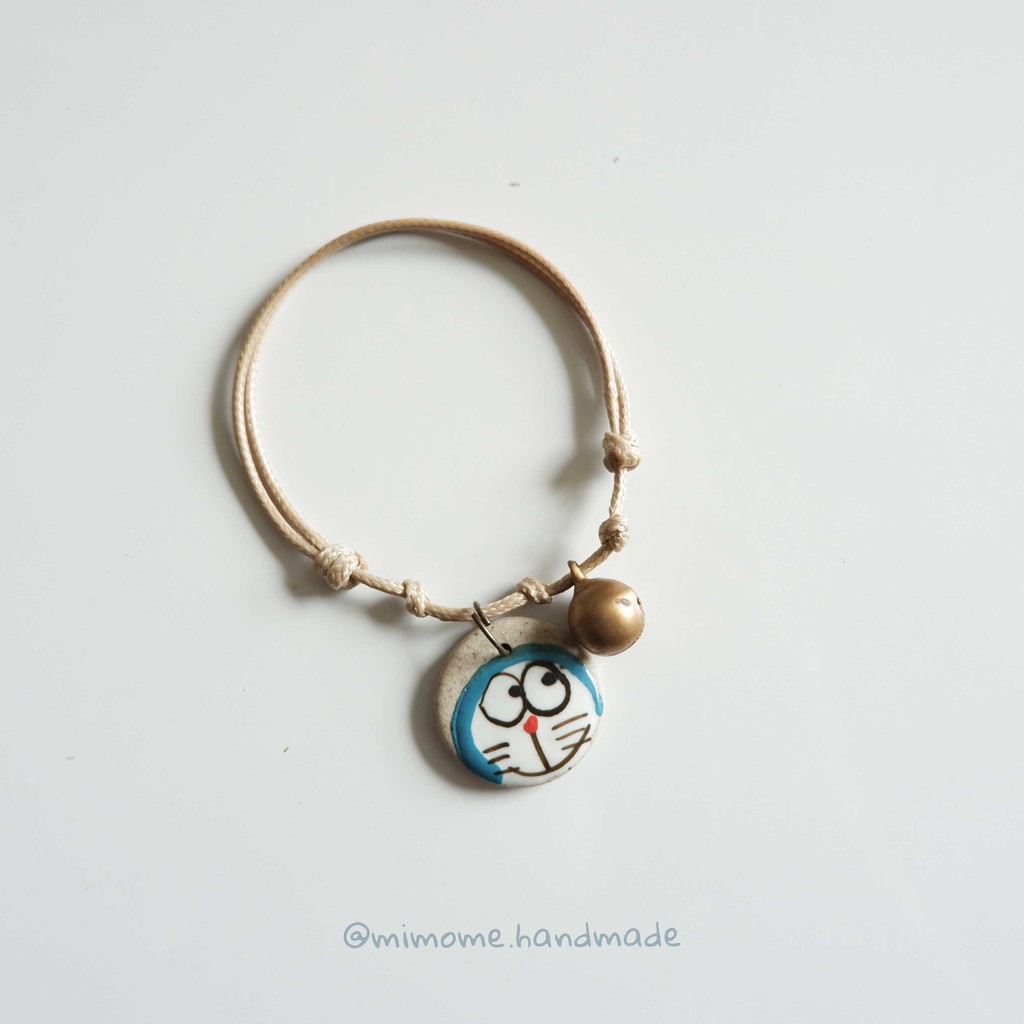 Vòng gốm dẹt phối chuông đồng vintage