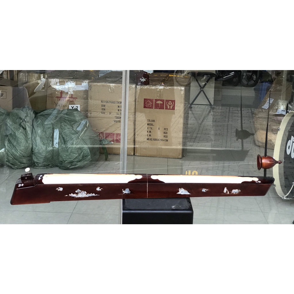 Đàn bầu xếp giá rẻ-tặng bao và que gãy