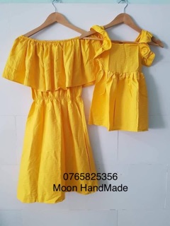 Đầm trễ vai mẹ bé