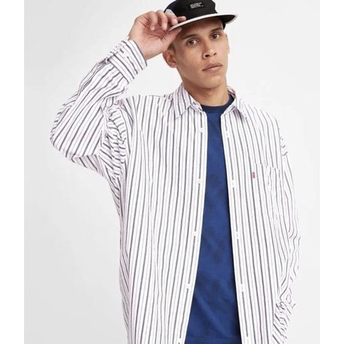 Áo sơ mi TBC unisex overfit. Mẫu sơ mi thời trang của T.B.C với chất vải linen mềm ít nhăn. Form overfit thời trang