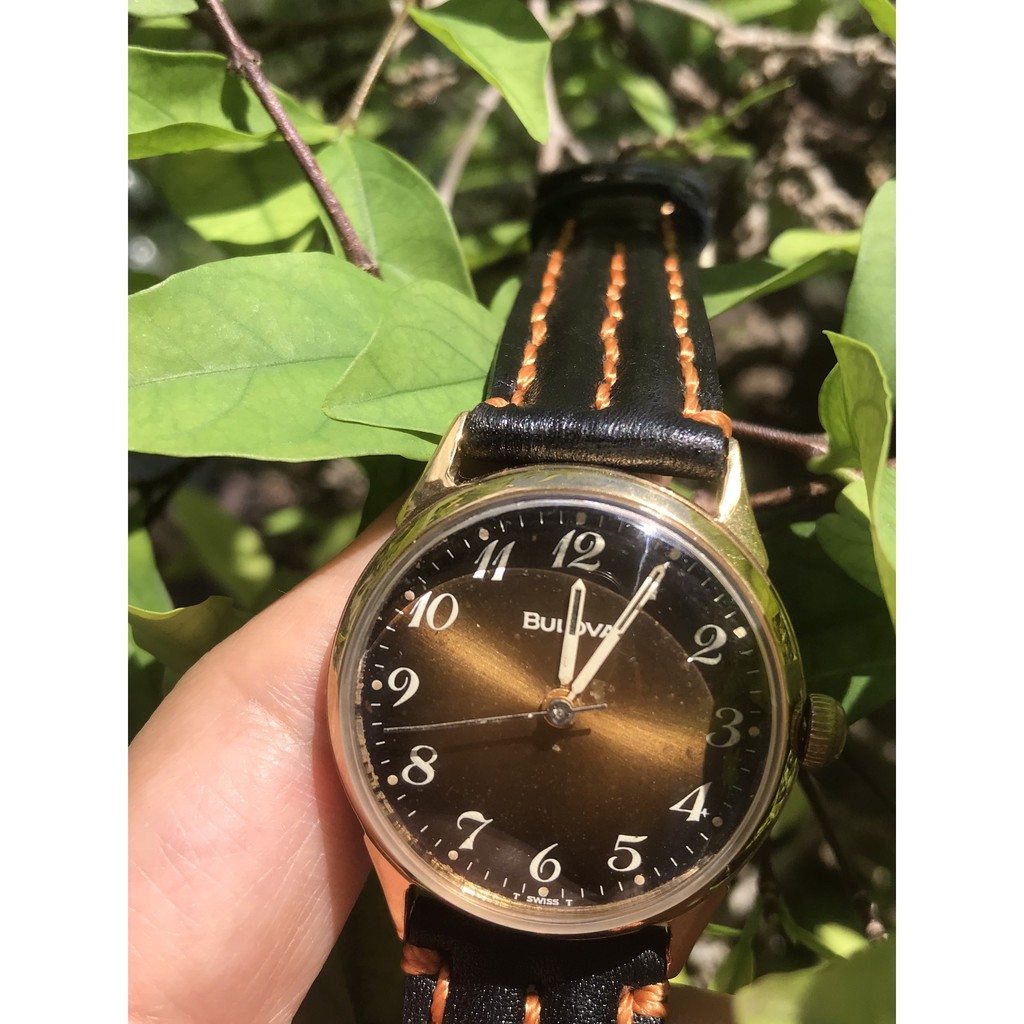 Đồng hồ nữ BULOVA cơ lên cót tay, máy vàng, mặt màu trà, niềng lắc kê vàng, dây da