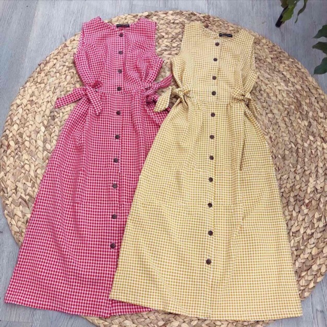Đầm sát nách karo có dây cột nơ 2 bên eo xinh xắn lung linh.hàng nhà sản xuất chất lương tuyệt đối ....