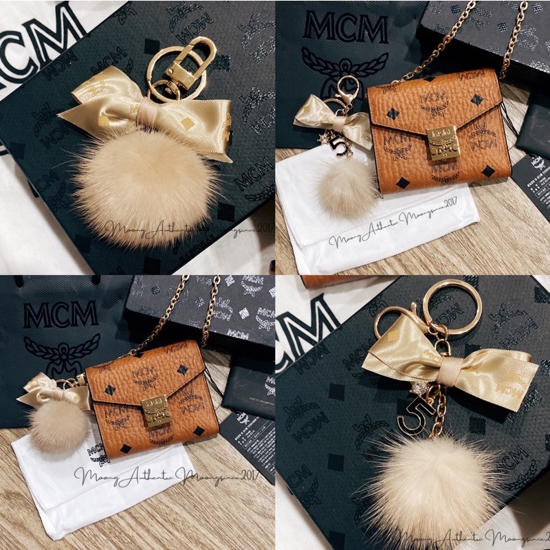 Charm Bông mix nơ hãng MCM auth