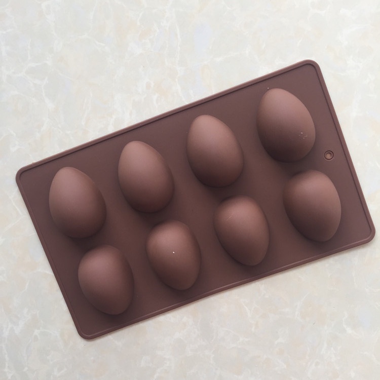 Khuôn silicone Làm Bánh 8 Lỗ Hình Quả Trứng Khủng Long