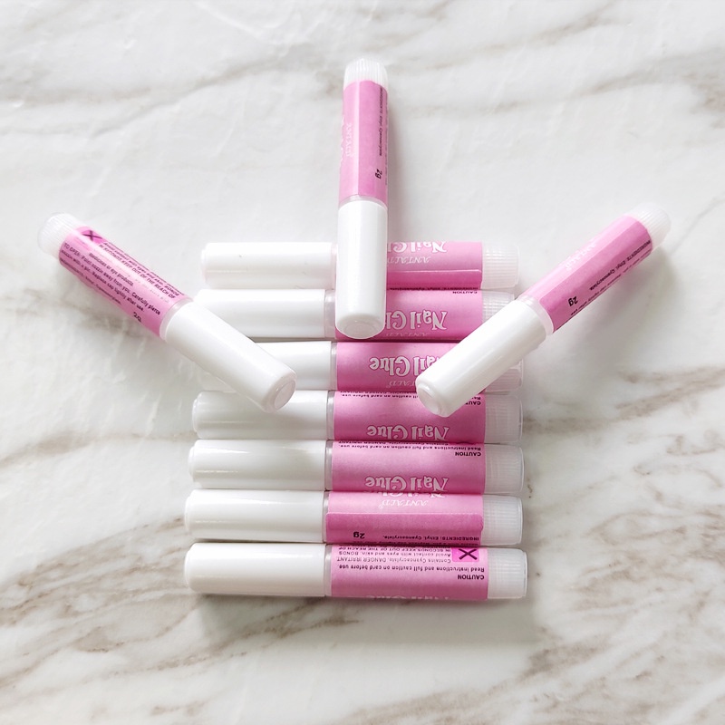 Keo dán móng tay không thấm nước 2g MINIGIRL KE1