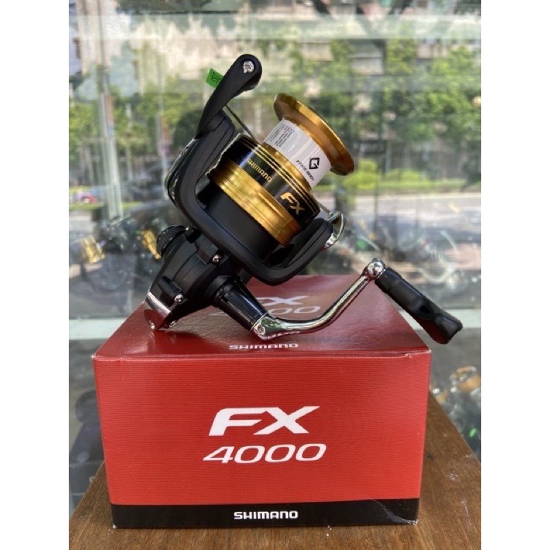 máy câu cá FX 4000 shimano hàng chính hãng máy tải cá lên 10kg y hình máy quay rất êm giá rẻ 9kka5rbal