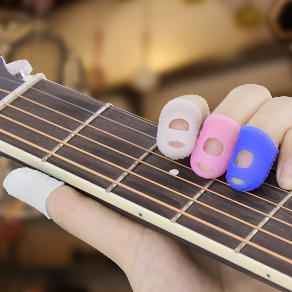Set 4 phụ kiện bọc ngón tay bằng silicon dùng chơi đàn Ukulele/guitar